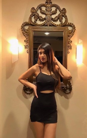 Elite VIP Call Girl in Karachi wearing red evening dress

